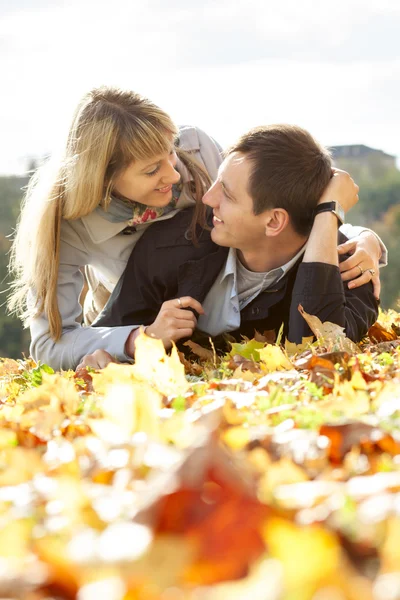 Young beautiful couple is laying — Stock Photo, Image