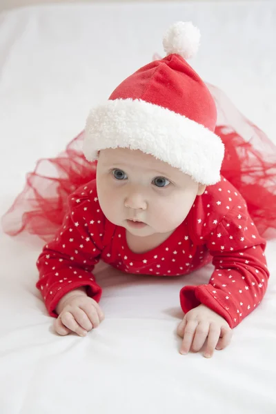 Linda niña en sombrero de Navidad —  Fotos de Stock