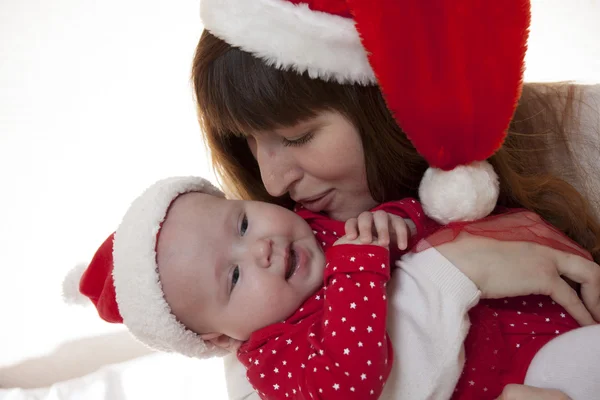 Mutter und Kind feiern Weihnachten — Stockfoto