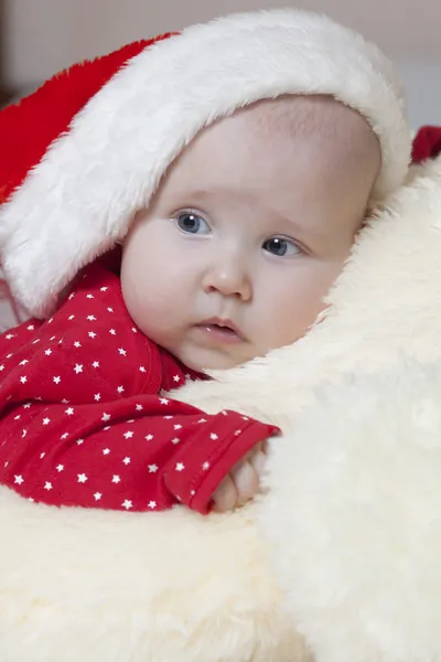 Cute Baby girl in christmas hat — Stock Photo, Image