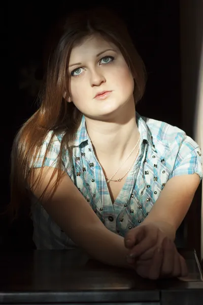 Sag girl sitting alone — Stock Photo, Image