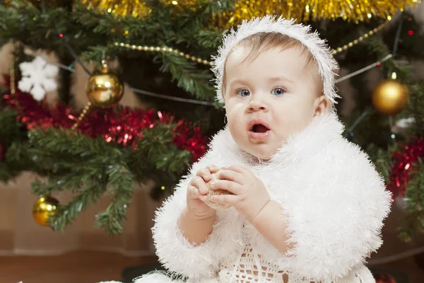 Happy little baby girl playing with fruits — Stock Photo, Image