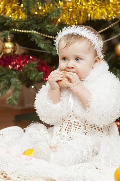 Happy little baby girl playing with fruits — Stock Photo, Image