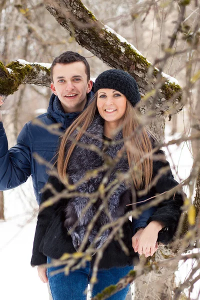 Happy Young Couple in Winter garden — Stock Photo, Image