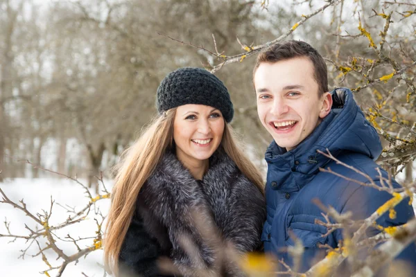 Happy Young Couple in Winter garden — Stock Photo, Image