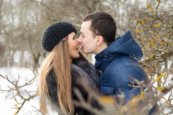 Happy Young Couple in Winter garden — Stock Photo, Image