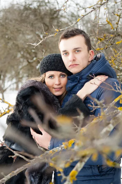 Happy Young Couple in Winter garden — Stock Photo, Image