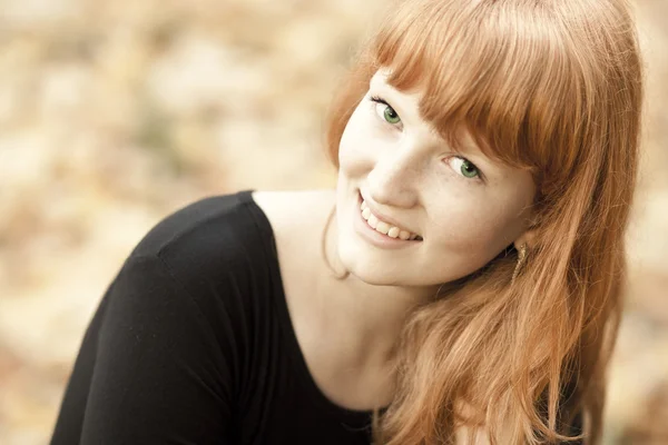 Cheerful young red haired girl — Stock Photo, Image