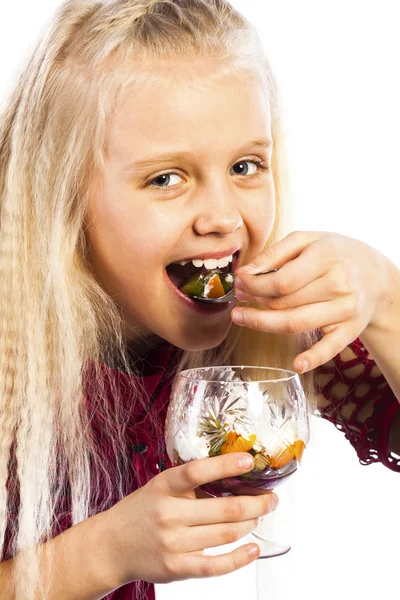 Hermosa chica rubia comiendo postre — Foto de Stock