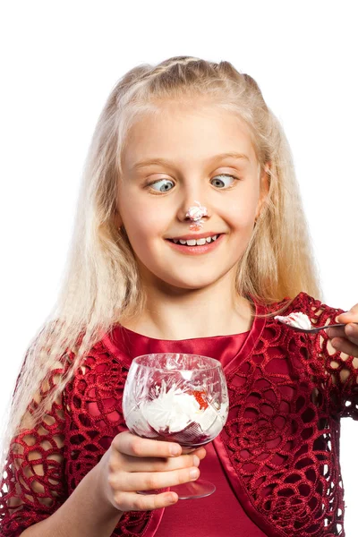 Beautiful blonde girl eating dessert — Stock Photo, Image