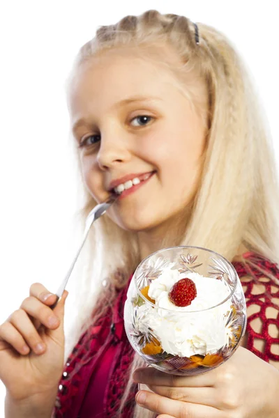 Beautiful blonde girl eating dessert — Stock Photo, Image