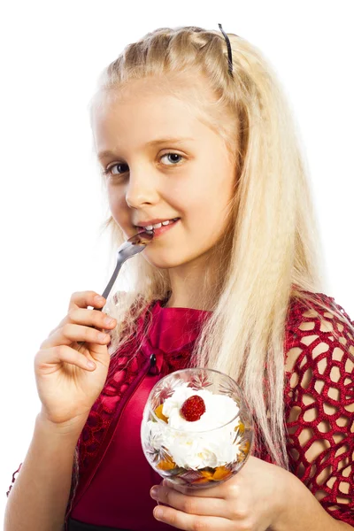 Beautiful blonde girl eating dessert — Stock Photo, Image