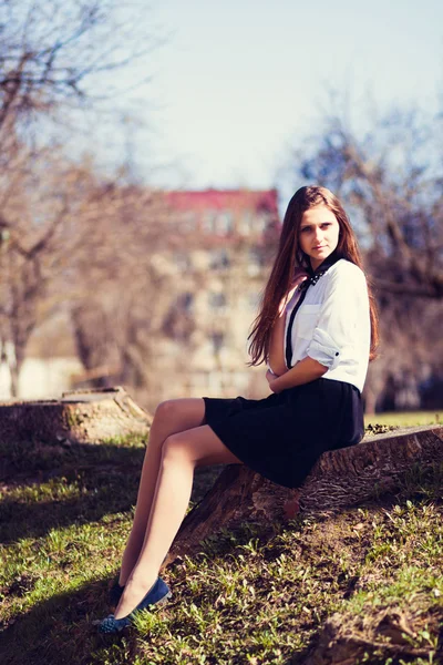 Beautiful girl sitting — Stock Photo, Image