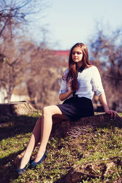 Beautiful girl sitting — Stock Photo, Image