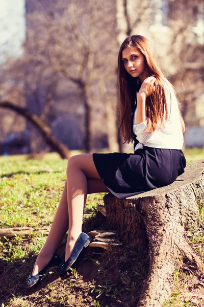 Beautiful girl sitting — Stock Photo, Image