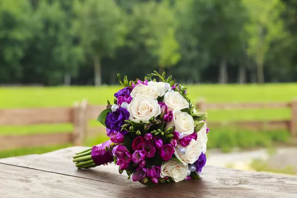 Wedding bouquet of white and blue roses Stock Picture