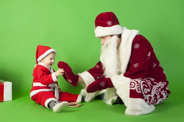 Father and son wearing Santa costume