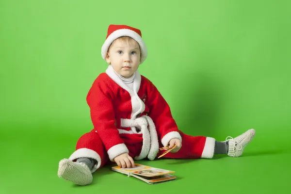 Beautiful boy wearing Santa costume — Stock Photo, Image