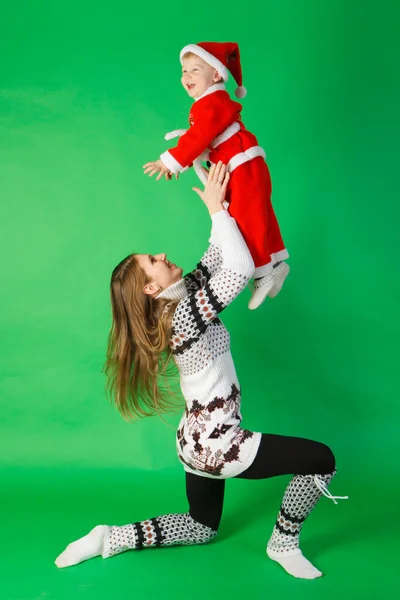 Father and son wearing Santa costume — Stock Photo, Image