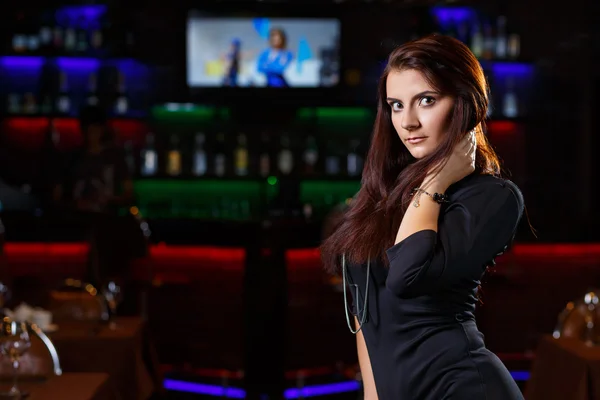 Pretty woman in nightclub — Stock Photo, Image