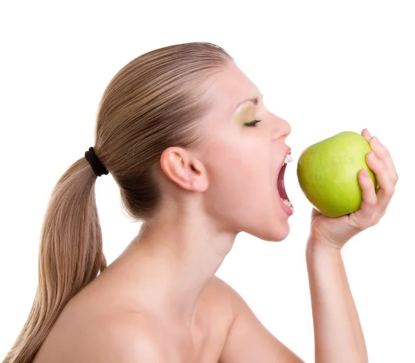 Ξανθιά γυναίκα με πράσινο μήλο — Φωτογραφία Αρχείου