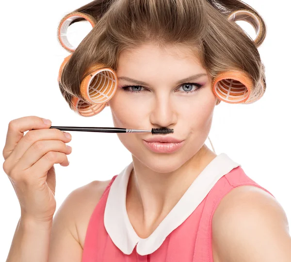 Mujer en rodillos de pelo — Foto de Stock