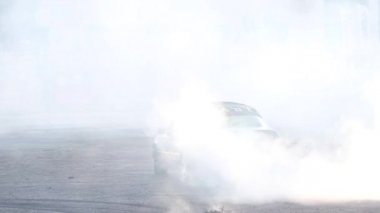 Tirana, Albania - July 2022: car show with drift and burnout smoke. High quality 4k footage