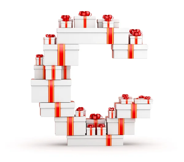 Буква С из коробок с подарками, украшенных красными лентами — стоковое фото
