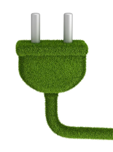 Електрична вилка покрита зеленою травою — стокове фото