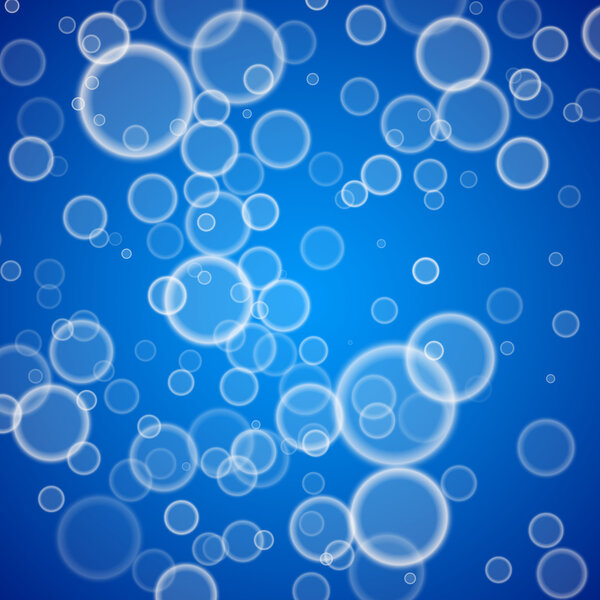 Macro bubbles of water on blue background