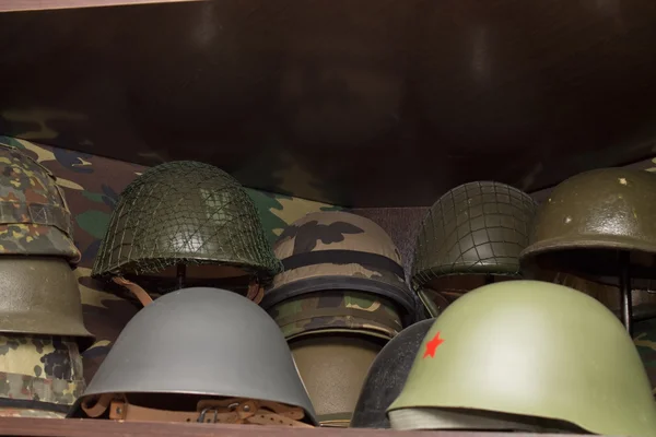 Helmets of different types of troops — Stock Photo, Image