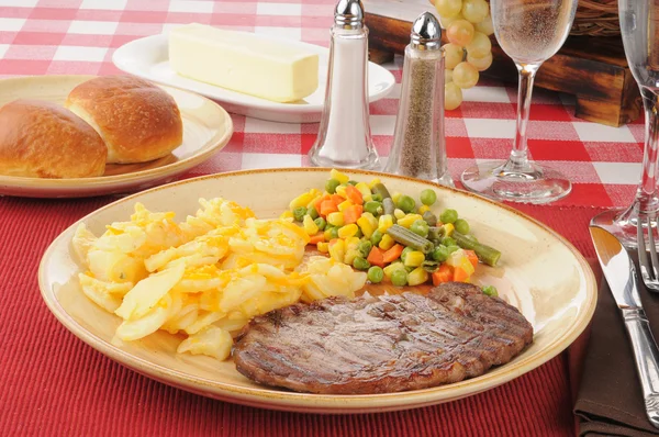 Rib steak and potatoes — Stock Photo, Image