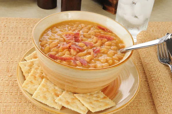 Bowl of bean and bacon soup — Stock Photo, Image