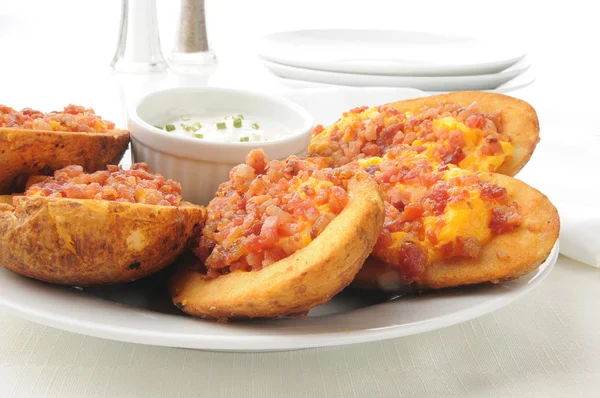 Cheese and bacon potato skins — Stock Photo, Image