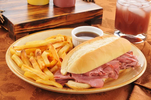 Roast beef sandwich with french fries — Stock Photo, Image