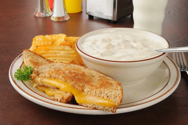 Grilled cheese sandwich with clam chowder — Stock Photo, Image