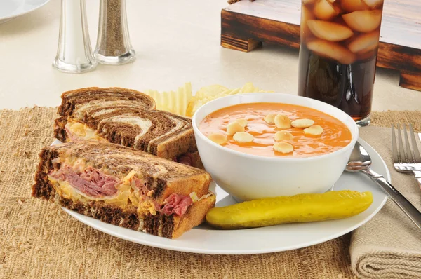 Reuben sandwich with tomato bisque soup — Stock Photo, Image