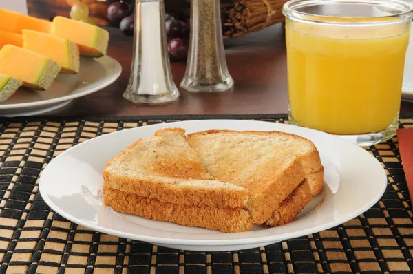 Toast and canteloupe — Stock Photo, Image