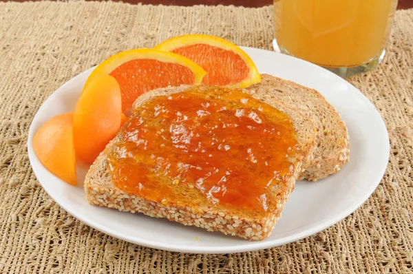 Apricot jam on toast — Stock Photo, Image