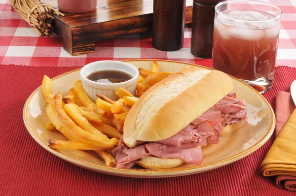 Roast beef sandwich and fries — Stock Photo, Image