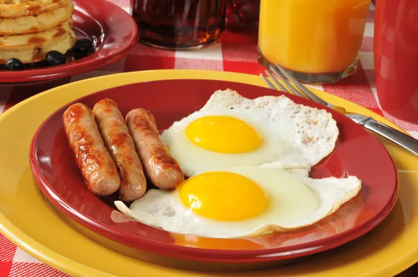 Sausage and eggs — Stock Photo, Image