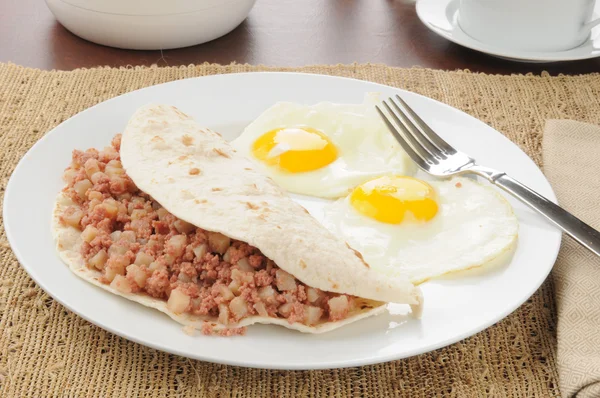 Corned beef hash breakfast burrito — Stock Photo, Image