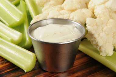 Celery, cauliflower and Ranch Dressing clipart