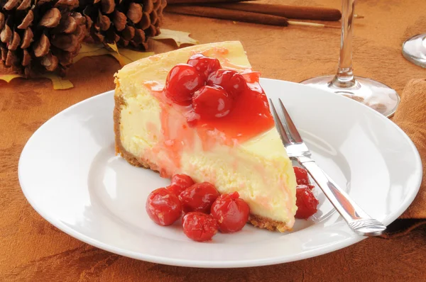 Cheesecake topped with cherries — Stock Photo, Image