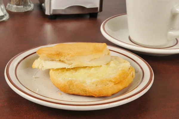 Fresh buttered biscuit — Stock Photo, Image