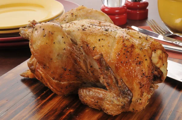 Roasted chicken on a cutting board — Stock Photo, Image