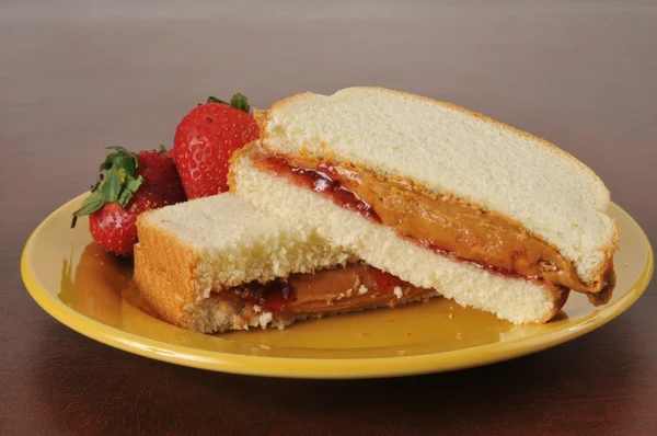 Peanut butter and strawberry jam sandwich — Stock Photo, Image