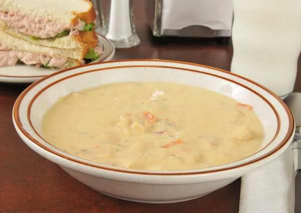 Chicken con queso soup with a sandwich — Stock Photo, Image