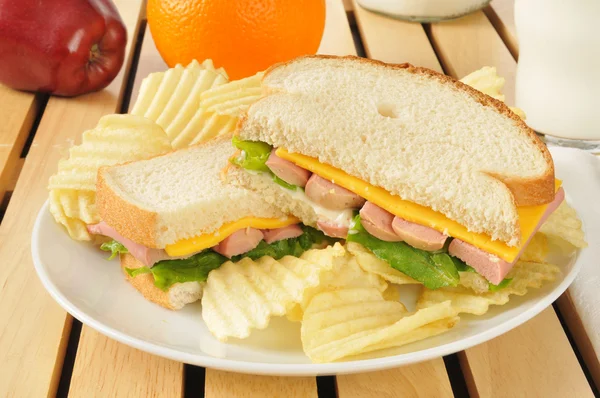 Vienna sausage sandwich with potato chips — Stock Photo, Image