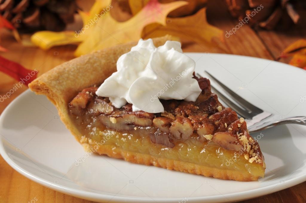 Pecan pie with whipped cream — Stock Photo © MSPhotographic 33373265